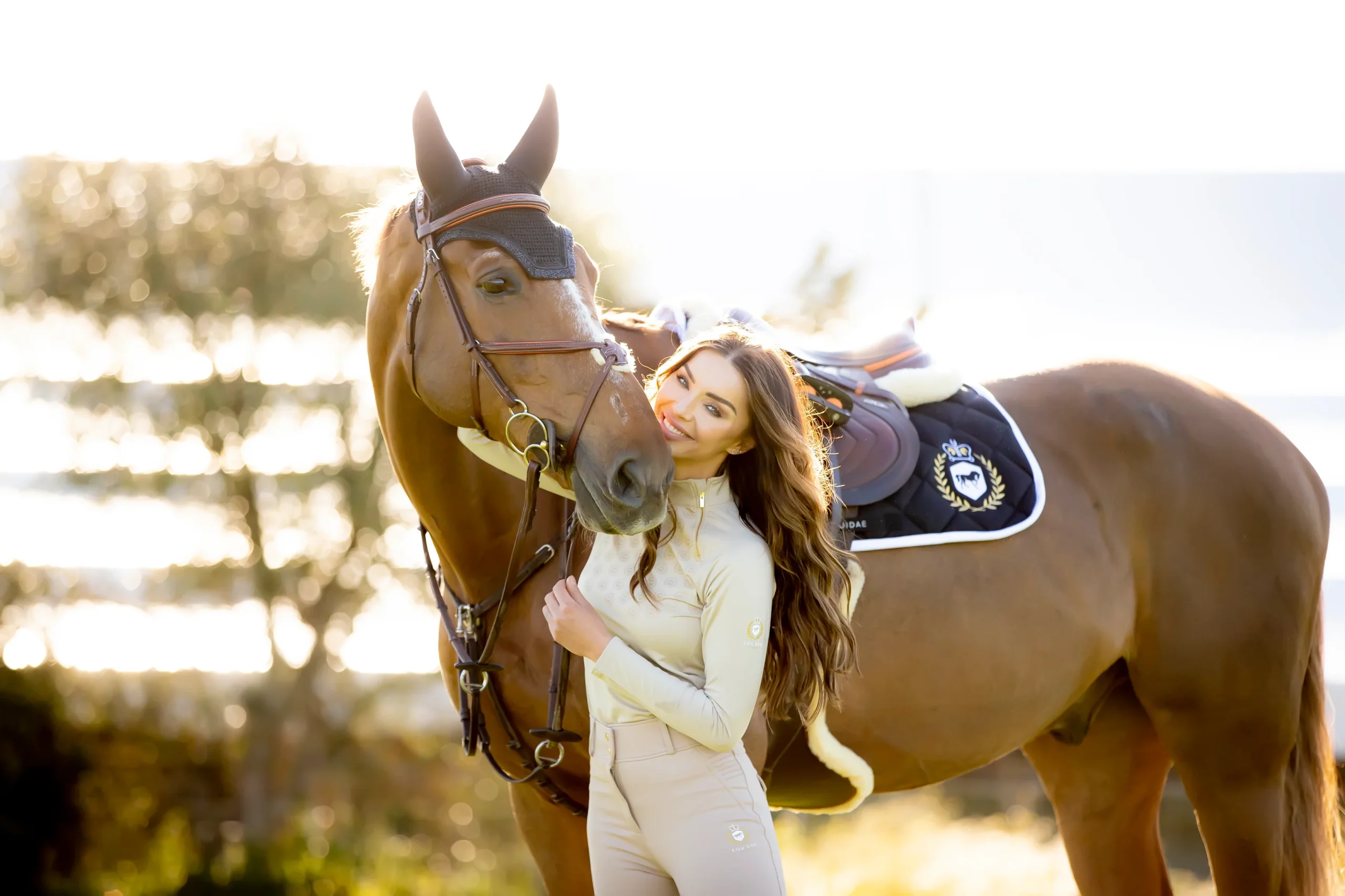 Nermina with horse wearing Equidae London equestrianwear, designed by J Mitchell Design