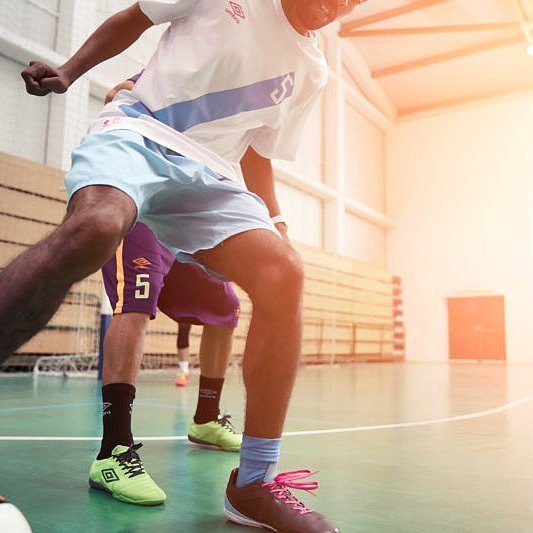 j-mitchell-umbro-manchester-activewear-designer Indoor futsal players wearing Umbro-designed kits and trainers
