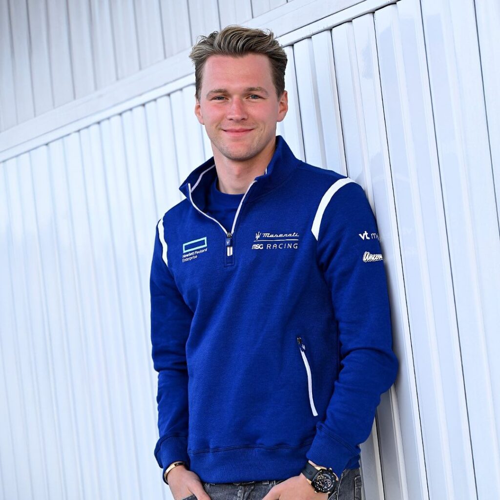 Maserati motorsport blue quarter zip sweatshirt Maserati MSG Racing branded quarter zip in blue worn by team member