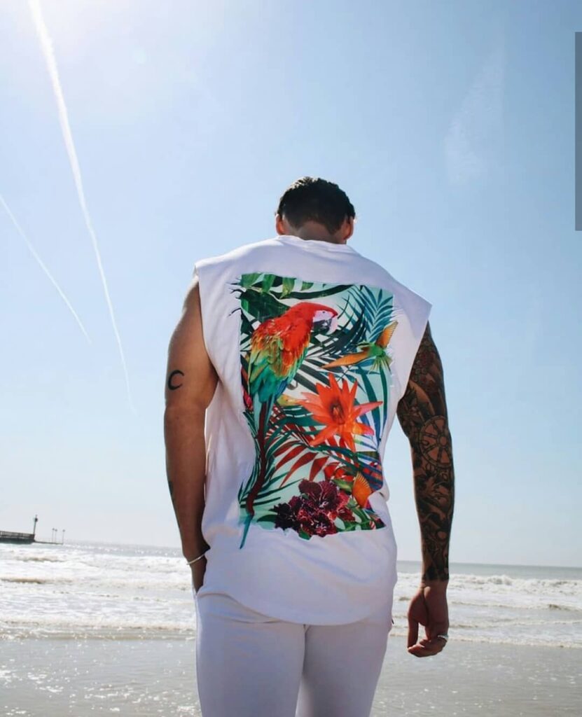 scar-tissue-beach-parrot-print-sleeveless-tee Streetwear beach vest with parrot graphic by Scar Tissue