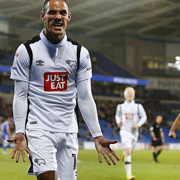 umbro-manchester-derby-county-football-kit-designer Derby County player Tom Ince celebrating in white Umbro home kit designed by J Mitchell Design